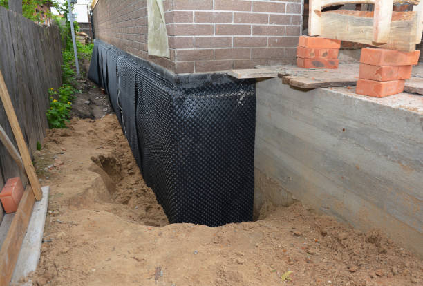 Happy homeowners after waterproofing job in Harrison Township
